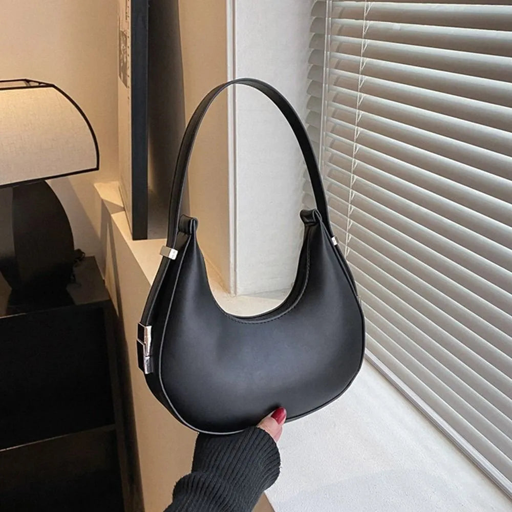 תיק עגול קטן- נייסי